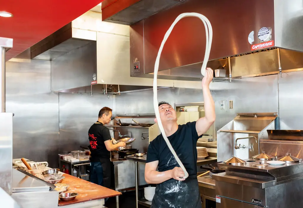 Chef Charlie Zhang providing some noodle pulling entertainment (Photo by Monika Normand)