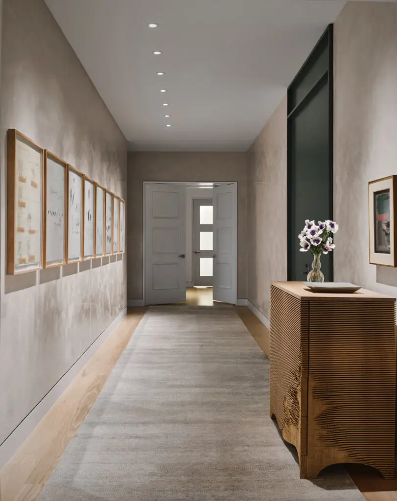 The east hall entry has eight lithographs by Cy Twombly and a Mark Rothko oil on paper and panel. Console by UK artist Gareth Neal. (Photo by Douglas Friedman)