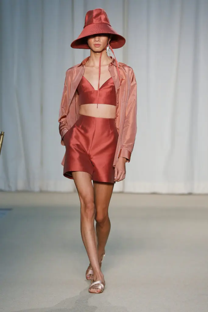 Adam Lippes apricot taffeta shirt, terracotta silk wool bralette, terracotta silk wool short, terracotta silk wool hat. (Photo courtesy of Adam Lippes_