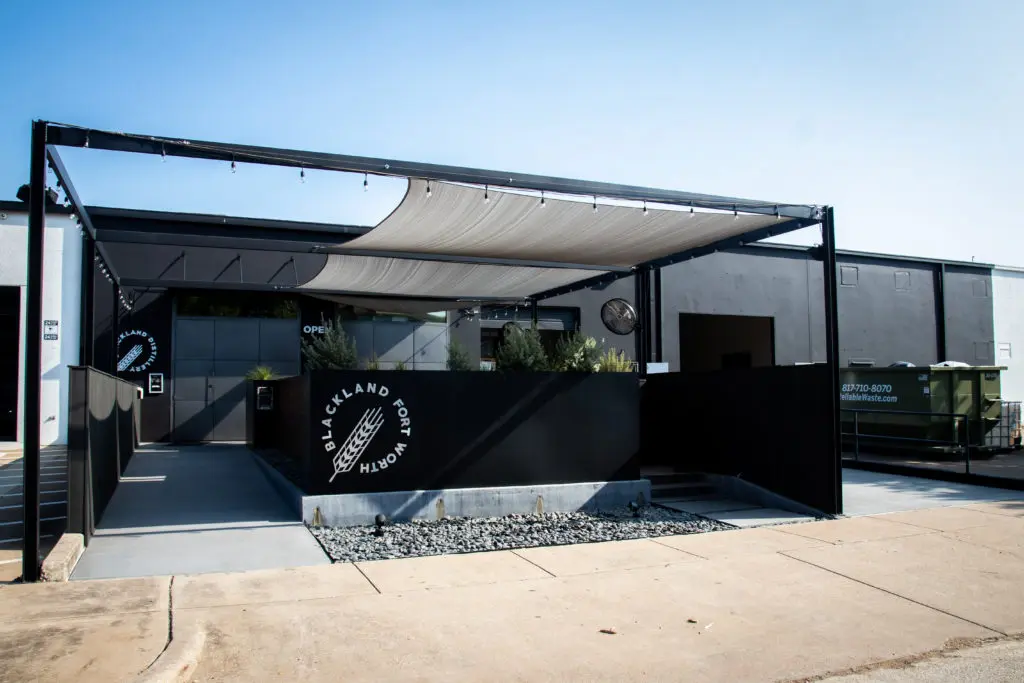 Exterior expansion and a view of the current outdoor patio for fall cocktail sipping and tastings.