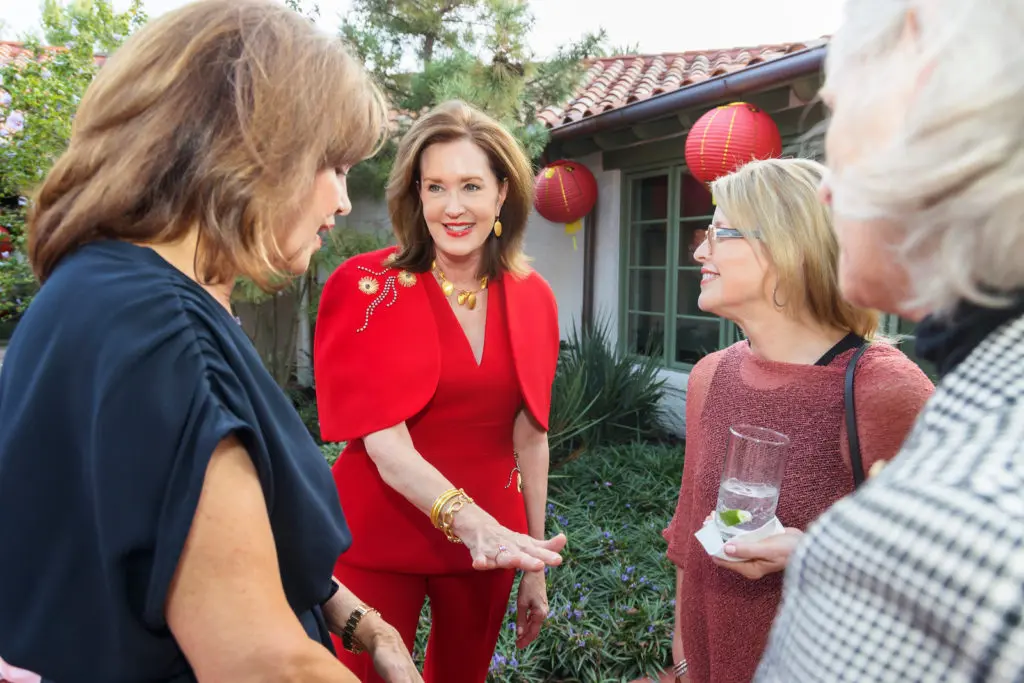 Chair Dana Porter models Lisa Nik Amethyst Ring at the 2021 Mah Jongg Play Day benefitting Tarrant Area Food Bank in Fort Worth, Texas. (Photo by/Sharon Ellman)