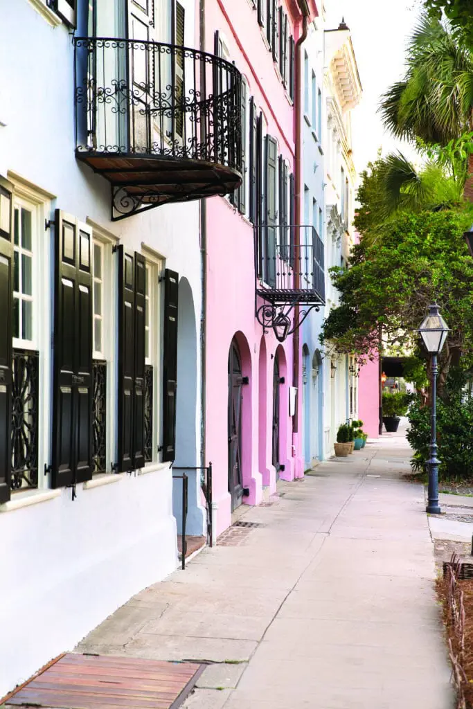 The colorful Georgian style houses that line this street in historic Charleston are called "Rainbow Row".