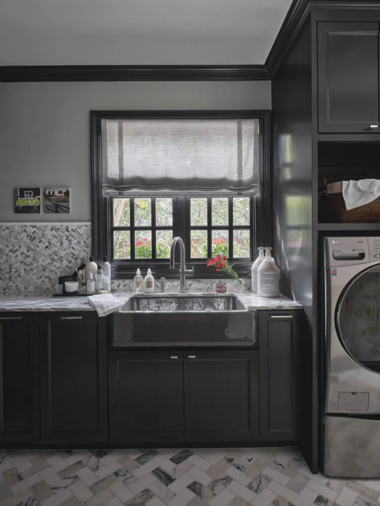 A chic laundry room by Kathleen Walsh Interiors (Photo by Stephen Karlisch)
