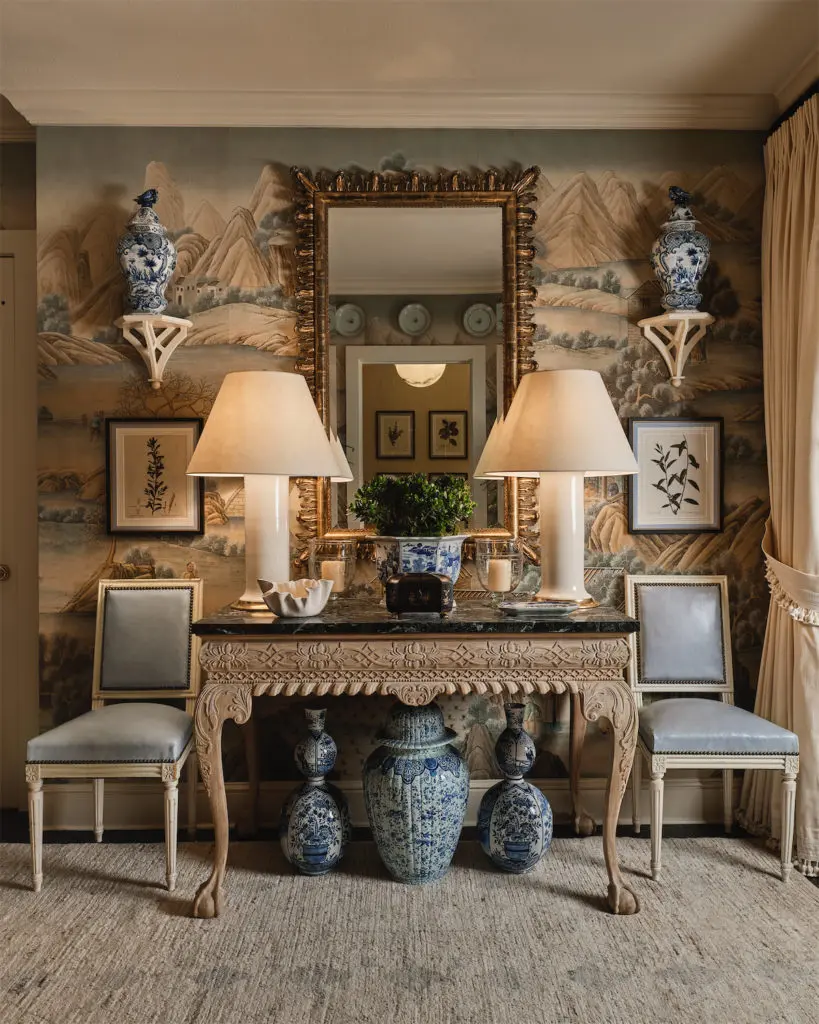 A hallway and powder bath by Caroline Gidiere Design LLC (Photo by Stephen Karlisch)