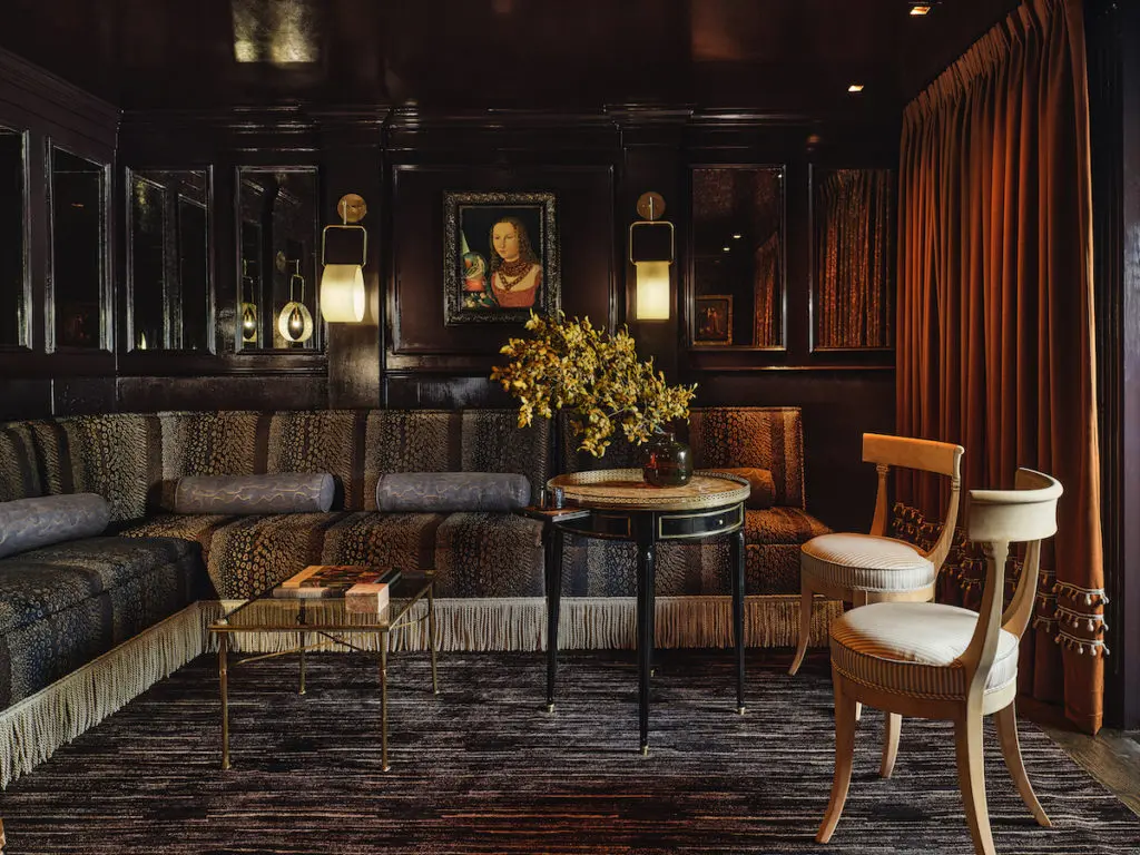 A feminine lounge by Liz MacPhail Interiors. (Photo by Stephen Karlisch. Flowers by Haile Wossen.)
