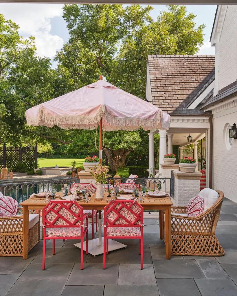 A sophisticated outdoor terrace and pool deck by Robin Henry Studio (Photo by Stephen Karlisch)