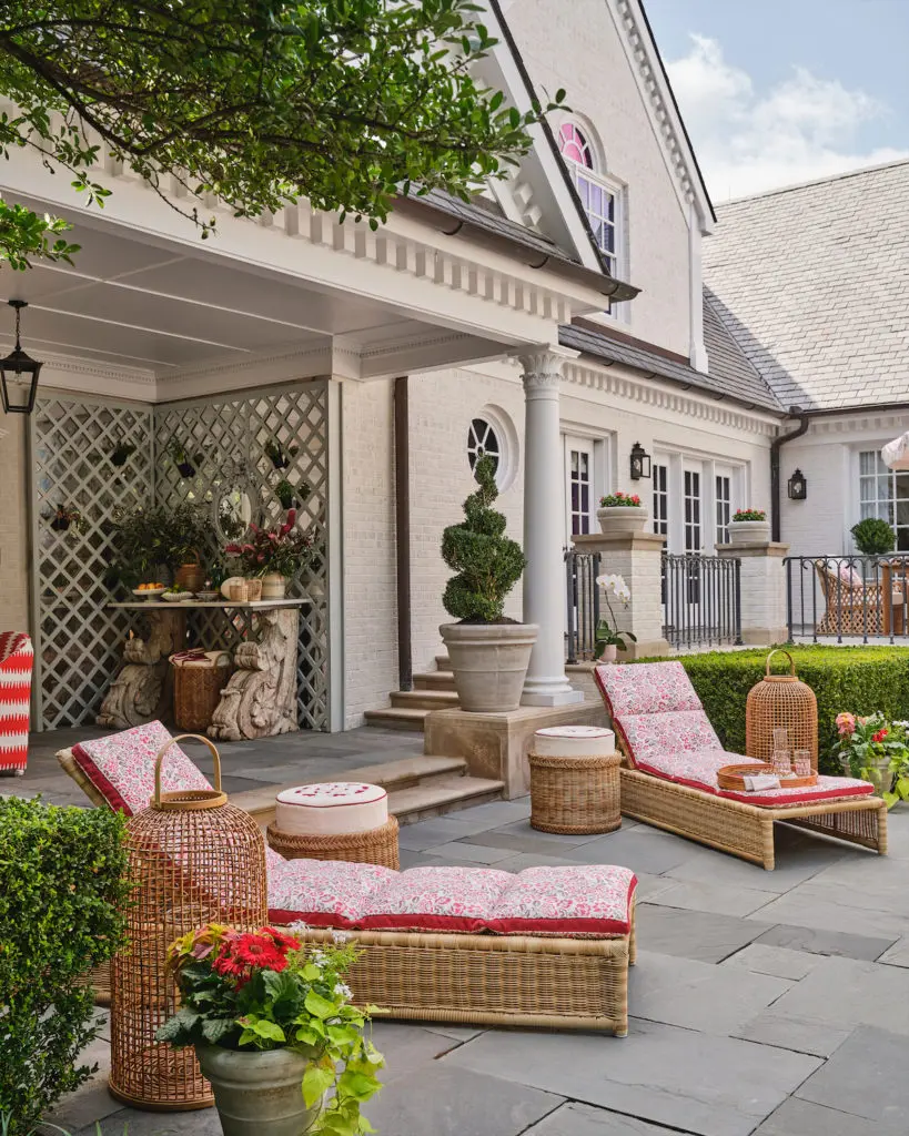 A sophisticated outdoor terrace and pool deck by Robin Henry Studio (Photo by Stephen Karlisch)