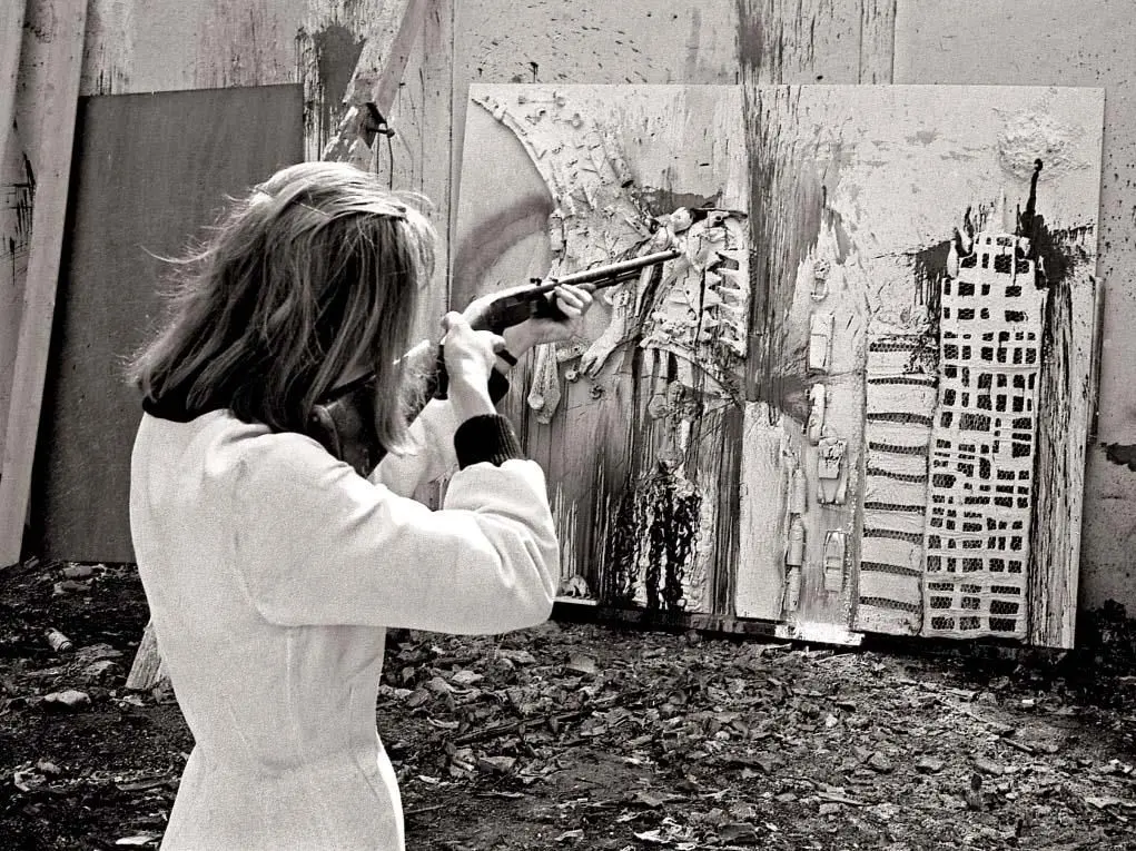 Niki de Saint Phalle during a shooting session at Impasse Ronsin, Paris, 1962. (© André Morain)