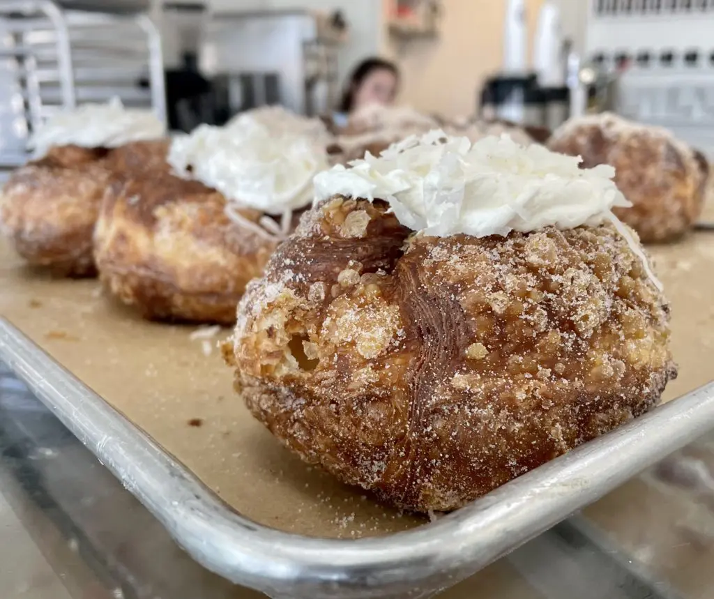 Check out the Coconut Cream filled cronut with those flaky layers. Photo by Courtney Dabney.