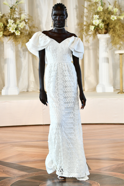 Markarian Roxie white lace off the shoulder gown with satin faced organza detailing. (Photo courtesy of Markarian)