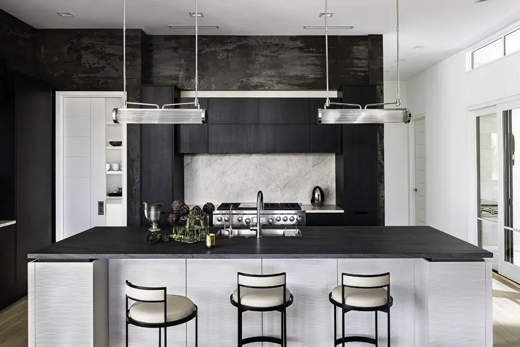 eggersmann chose these eye-catching pendants to accent the kitchen bar and balance the space.  (Photo by Manny Rodriguez)