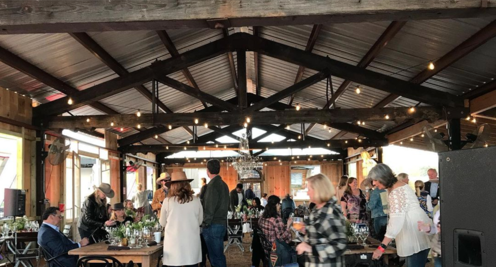 The hospitality pavilion at the The Halles, has been reimagined as a VIP lounge and chill zone — a first of its kind at the Round Top antique shows.