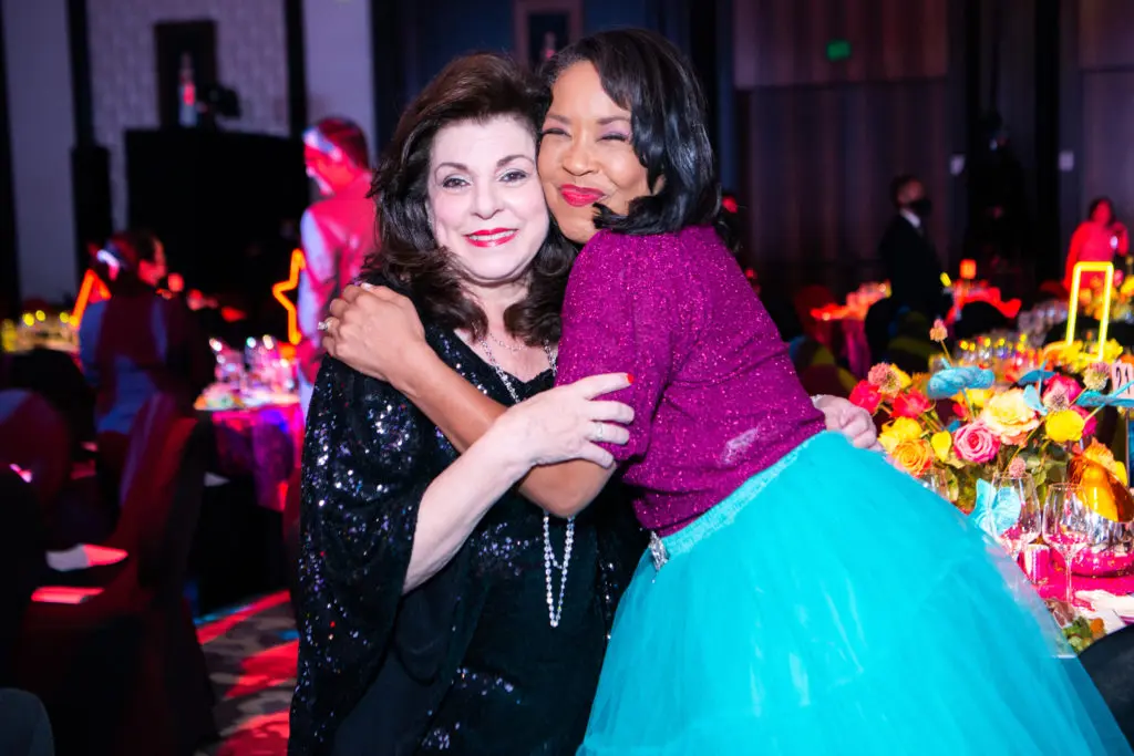 Houston Children's Charity CEO Laura Ward and gala emcee Gina Gaston Elie at The Post Oak Hotel with special guest, Cyndi Lauper. (Photo by Michelle Watson, CatchlightGroup.com)