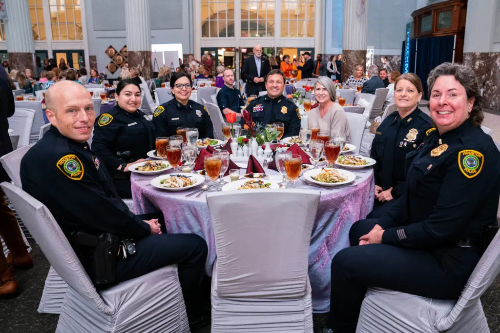 Police officers, usually the first responders in domestic violence cases, had their own table at the luncheon.