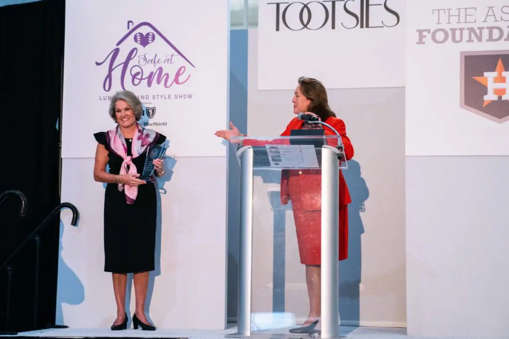 Harris County District Attorney Kim Ogg presented Twila Carter with a special award to recognize her efforts in fighting domestic violence.