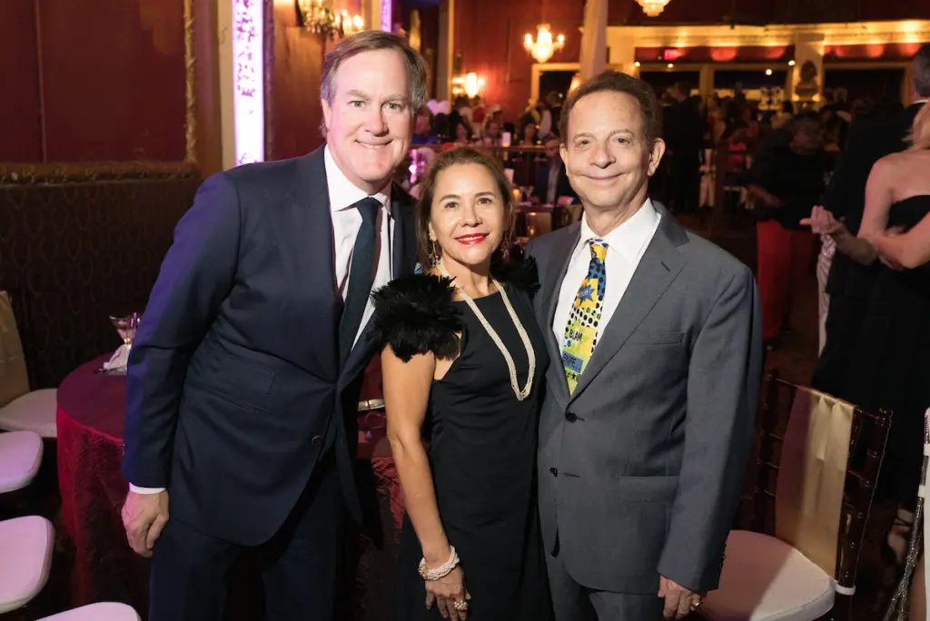 Peter Cooper, Dr. Penelope & Lester Marks at the Houston Arts Alliance Moulin Rouge themed gala at the Majestic Metro theater. (Photo by Daniel Ortiz)