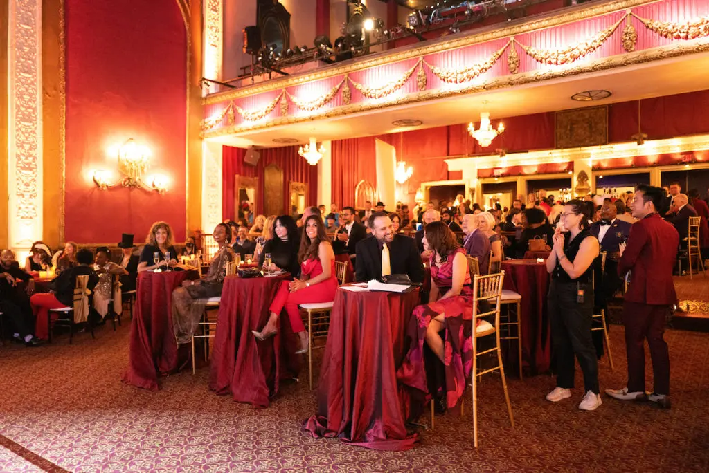 The scene at the Houston Arts Alliance Moulin Rouge themed gala at the Majestic Metro theater. (Photo by Daniel Ortiz)