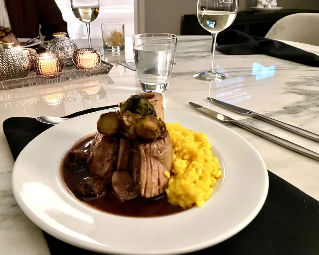 Osso Bucco with saffron risotto, prepared by new chef Javier Maysonnet. Photo by Courtney Dabney. 