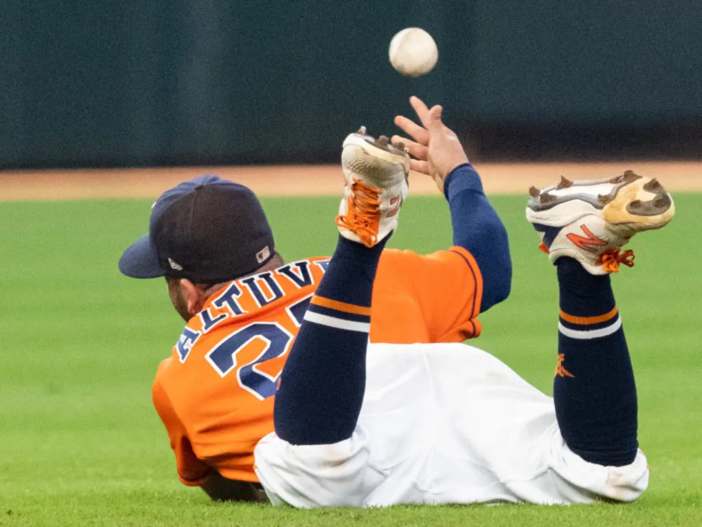 Jose Altuve made a spectacular defensive player diving in the grass. (Photo by F. Carter Smith)