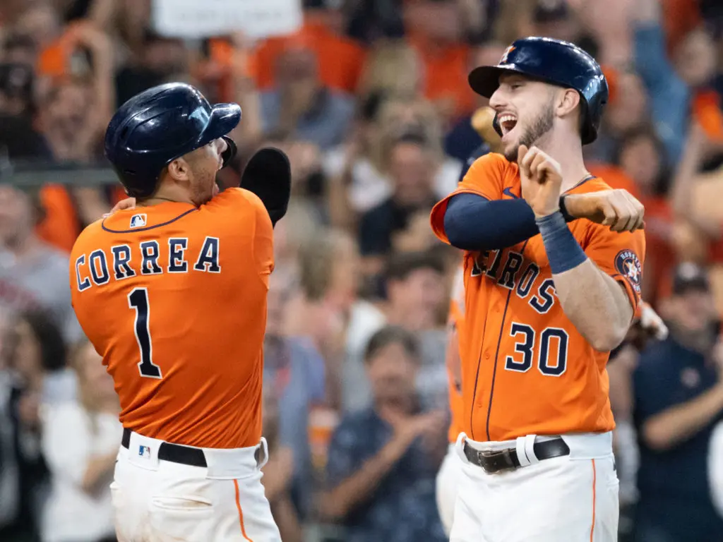 Carlos Correa and Kyle Tucker are in all on this Astros' playoff mission. (Photo by F. Carter Smith)