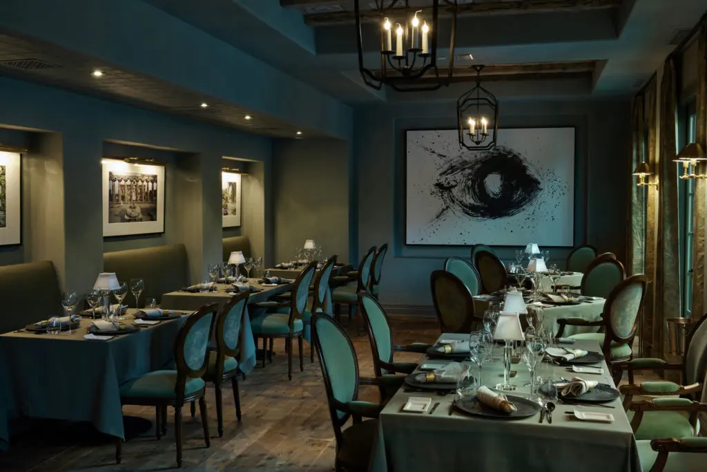 Primary artwork in Ristorante Alba is a painting by Carolyn Mara, the Borlenghis' daughter, and Slim Aarons photos from the La Dolce Vita collection.