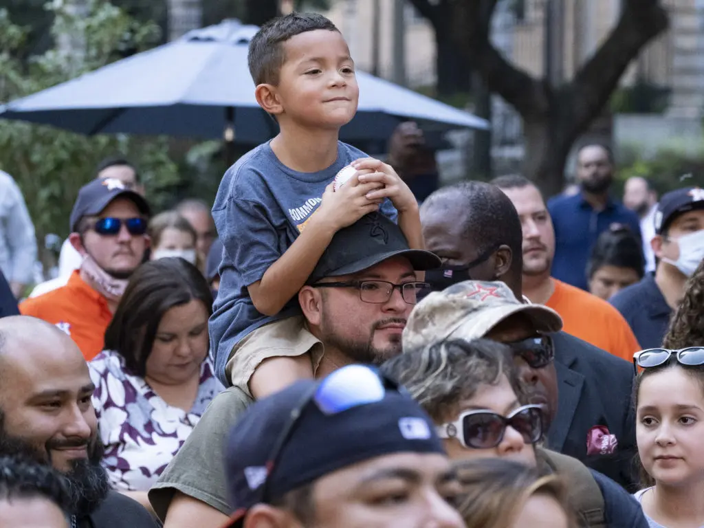 Astrios fans turned out for the rally. Some worked to get a better view. (Photo by F. Carter Smith)