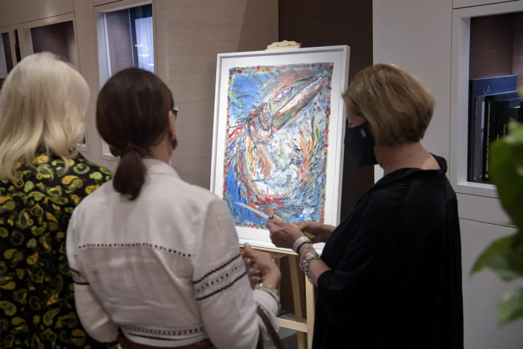 Admiring a painting at Audemars Piguet  (Photo by Bruno, Snap the Picture)