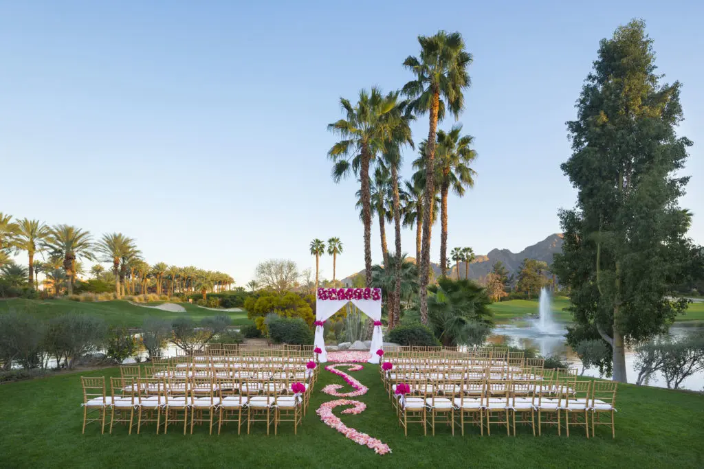 Weddings take place in the outdoor garden with amazing backdrops at Hyatt Regency Indian Wells.