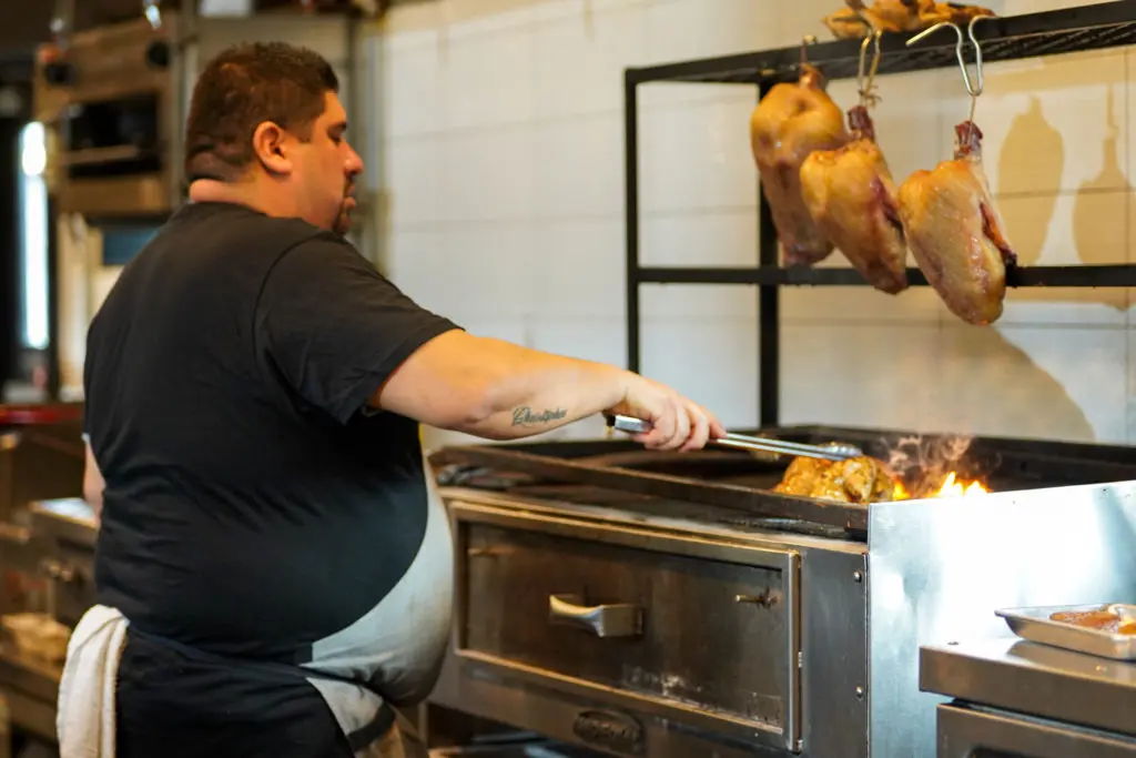 Chivos chef Thomas Bille is already hard at work. (Photo by Dylan McEwan)