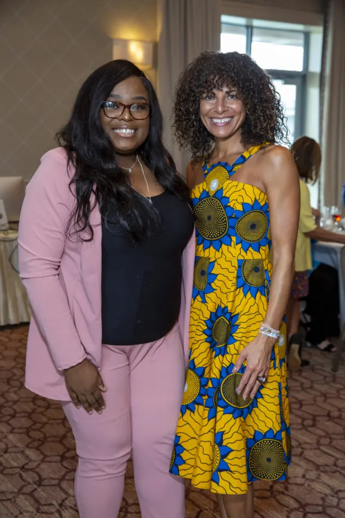 Danielle Smith, April Dinwoodie at the Arms Wide Adoption Services luncheon. (Photo by Jenny Antill Clifton)