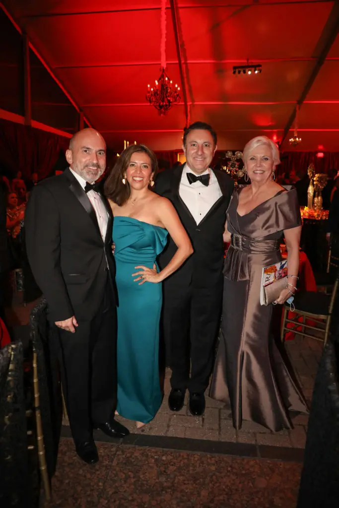 Esteban Leccese, Patricia Morales, Tom Ajamie, Sallie Sargent at the Carmen-themed dinner that followed the Houston Grand Opera season opener. (Photo by Melissa Taylor)