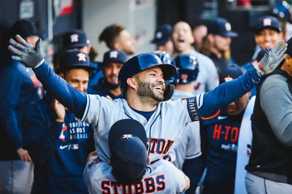 Jose Altuve hit a three run bomb in the ninth to seal it. And then got lifted in the air by backup catcher Garrett Stubbs during the dugout celebration. (@Astros)