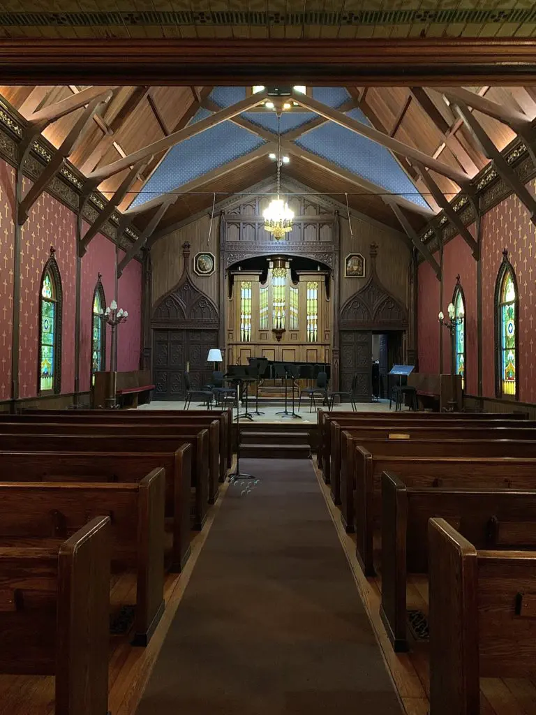 The 1883-era sacred interiors of Festival Hill's Edythe Bates Old Chapel possess a mauve-inflected palette reflected in the inaugural Colors of Round Top Collection by Benjamin Moore. 