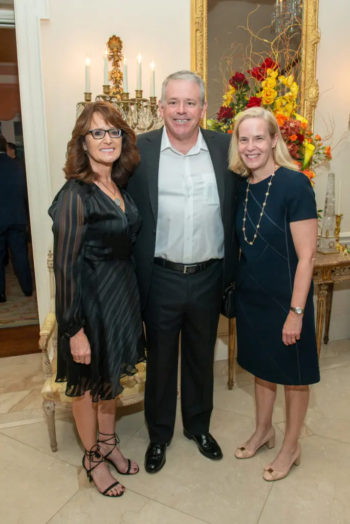 Karma & Tom Thompson, Elizabeth Matthews at The American Hospital of Paris Foundation dinner. (Photo by Jacob Power)