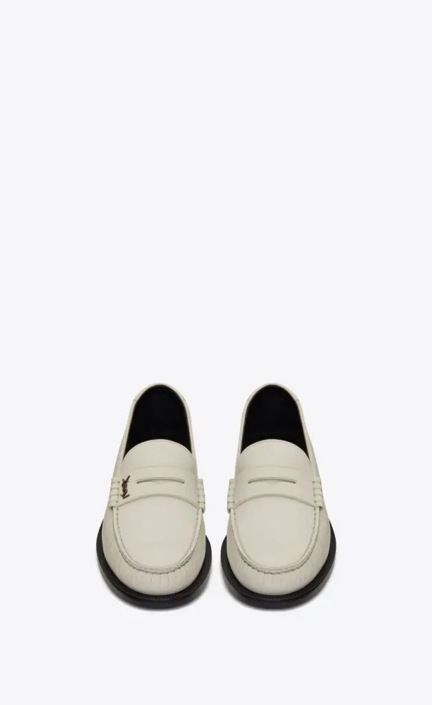 Saint Laurent penny loafers in smooth white leather. 
