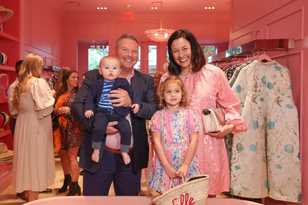 Mark Latham holds baby Luke Latham, Elle Colbert, Carrie Colbert Latham at the La Vie Style House party in Houston (Photo by Johnny Than)