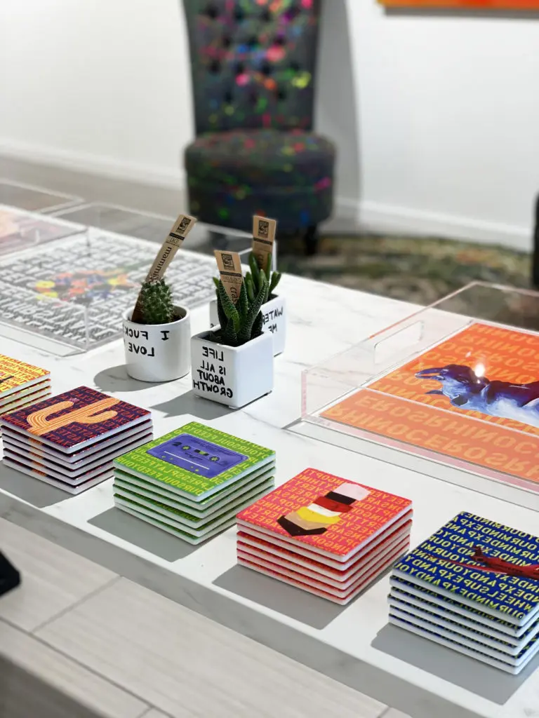 The colorful pop up shop is full of fun whimsical gift items like coasters and trays.
