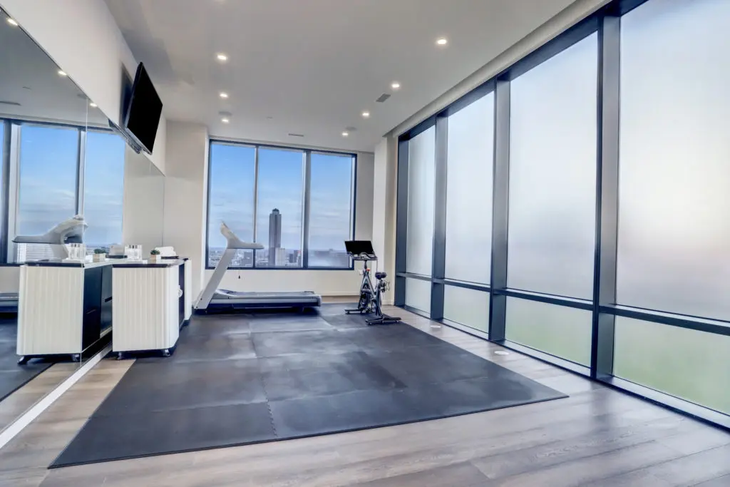 The exercise room in The Astoria penthouse, at 9,500 square feet it is on the market for $7,999,999 with Nancy Almodovar, founder of Nan and Company Properties. (Photo by TK Images)