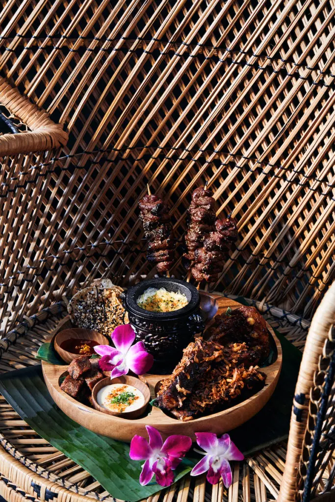 The Pupu Platter with BBQ beef skewers, Skewers, Mochiko wings, Yokozuna ribs, "Crab Lagoon," "Taro Tots," and house pickles. (Photo by Jody Horton) 