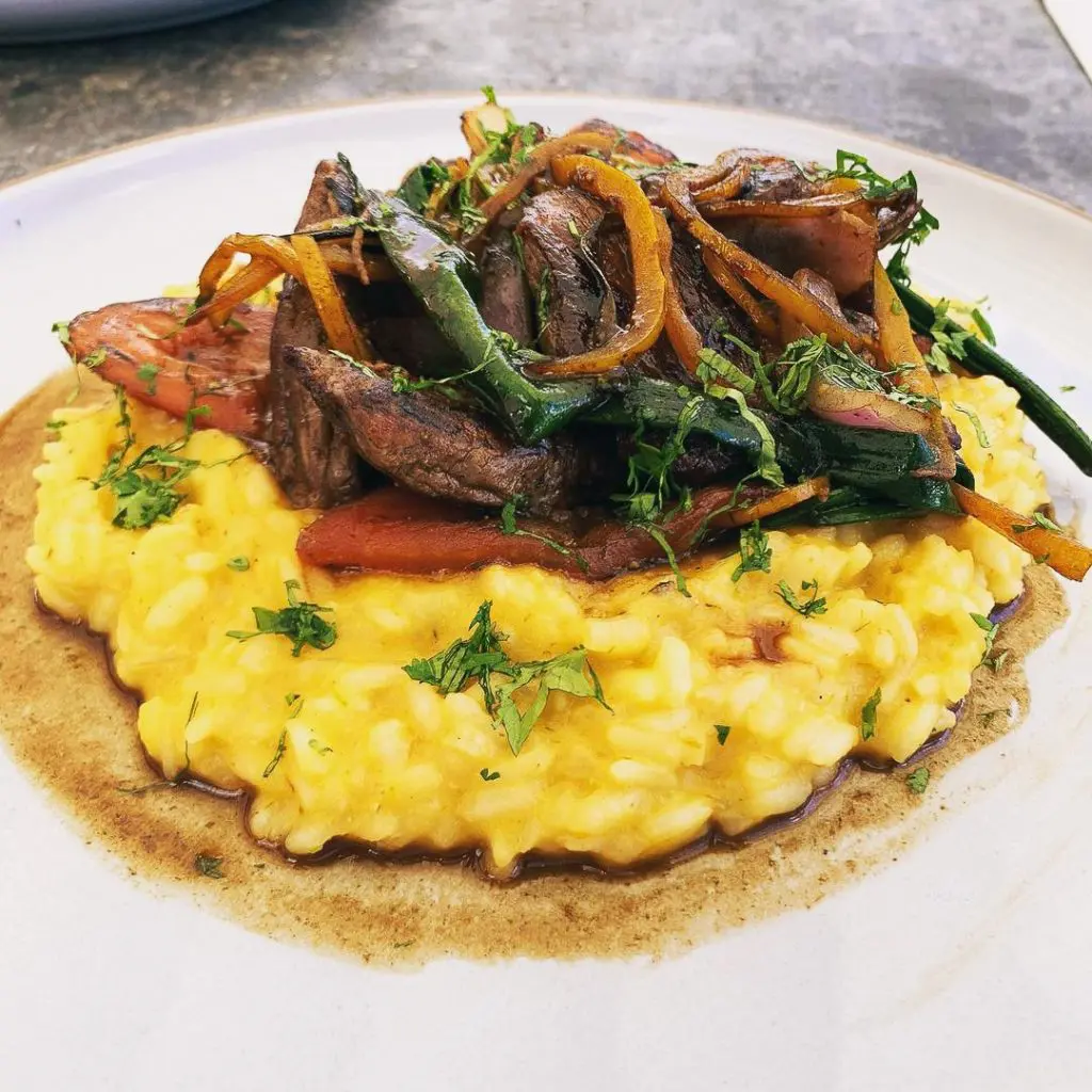 The aji pepper risotto with au jus beef filet blends Peruvian and Italian in one dish.