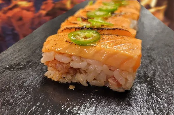 The lightly charred salmon nigiri at Quince's original location. 