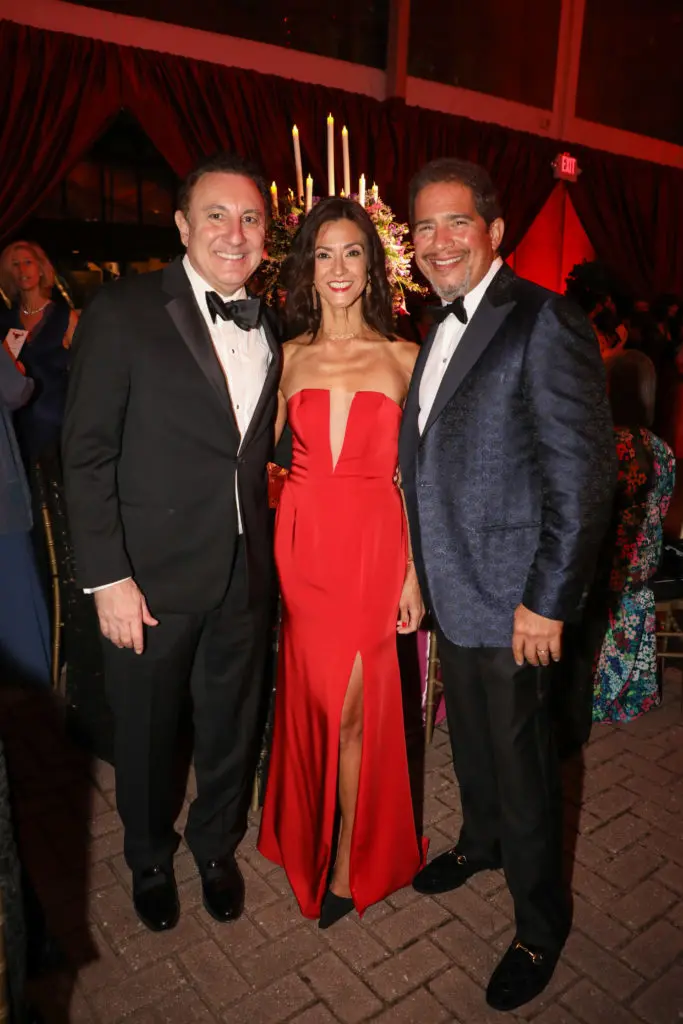 Tom Ajamie, Maria Victoria Vargas, Chuck Silverman  at the Houston Grand Opera opening night dinner following the production of Carmen. (Photo by Melissa Taylor)