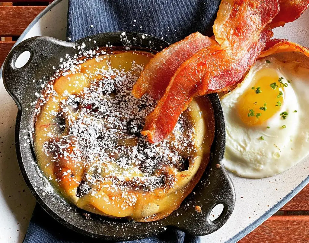 Wishbone & Flynt's Dutch Baby is served in a cast iron skillet.