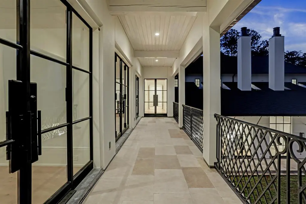 The covered breezeway connects the game room to the exercise room and guest suite. (Photo by TK Images)