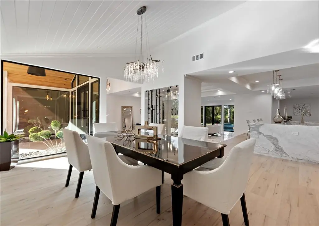 The home boasts Subzero and Wolf appliances, Carrera marble, Italian porcelain tiles, a home generator, brass fixtures, wide oak plank flooring and custom cabinetry from Benedettini.