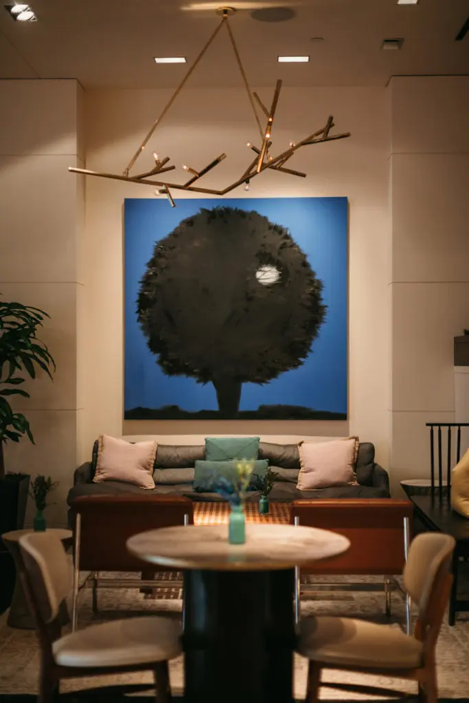 Ann Craven's paintings at The Joule include a pair of black trees hiding the moon.