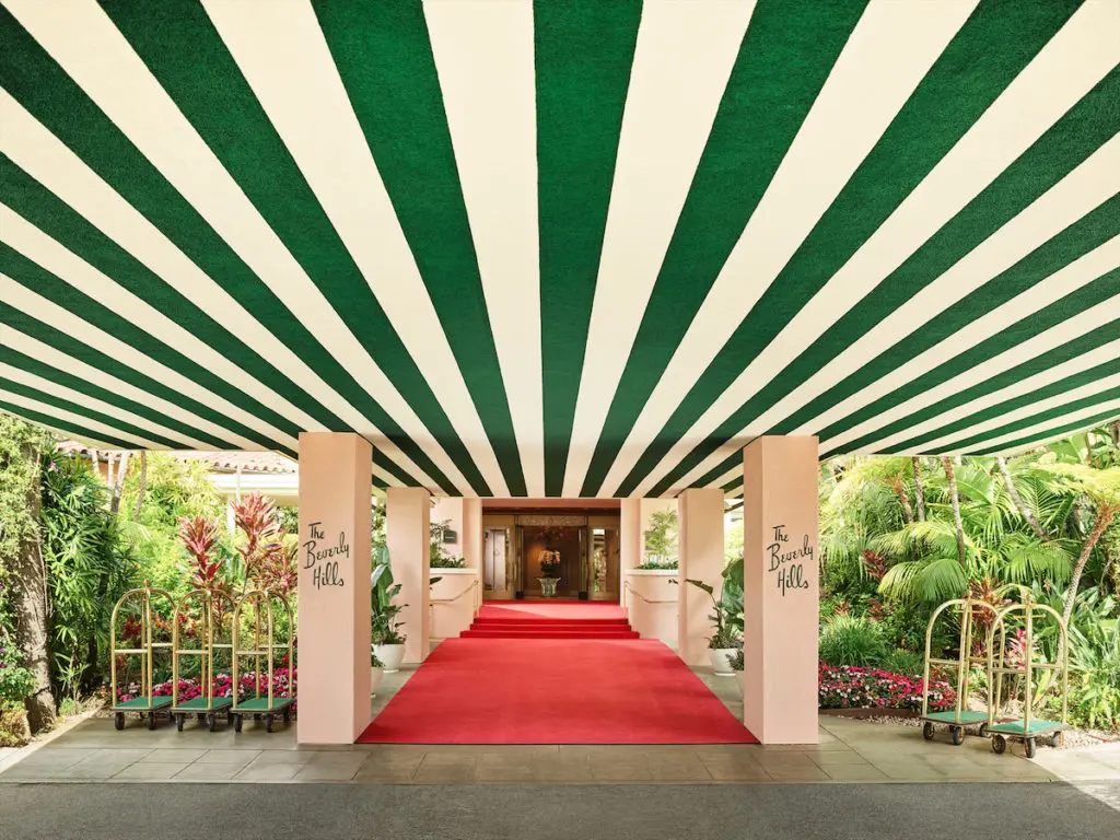 The Beverly Hills Hotel's iconic entrance along Sunset Boulevard.