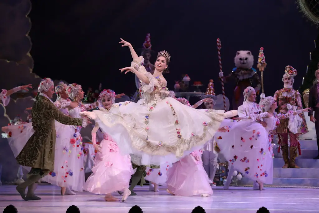 Houston Ballet First Soloist Allison Miller as Clara in 2019 with artists of Houston Ballet in Stanton Welch’s The Nutcracker. She reprises the role in 2021. (Photo by Lawrence Elizabeth Knox, Courtesy of Houston Ballet)

