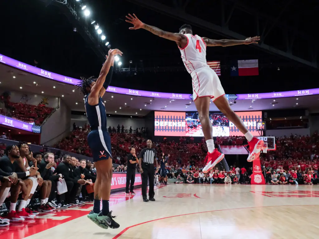 When Taze Moore skies high to challenge a shooter, he's really skying. ESPN's Jay Bilas singles out Moore. (Photo by F. Carter Smith)