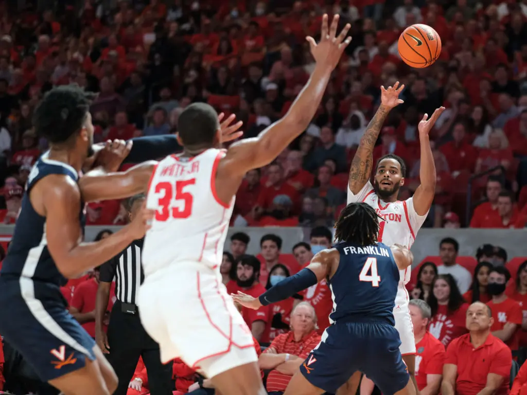 Fabian White Jr. is ready for Kyler Edwards' entry pass. (Photo by F. Carter Smith)